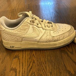 AIR FORCE 1s with space grey and snake skin detail